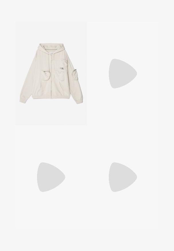 MM6 Maison Margiela Zip-up sweatshirt - chalk; Black cotton t-shirt with a crew neck, short sleeves, and a rectangular white label featuring numbers and a graphic design.; Black wide-leg pants made from soft fabric. Features an elastic waistband, smooth texture, and a simple, modern design without patterns.; White sneakers with a smooth leather upper, beige suede accents, flat laces, and a textured rubber sole, paired with light-colored wide trousers.