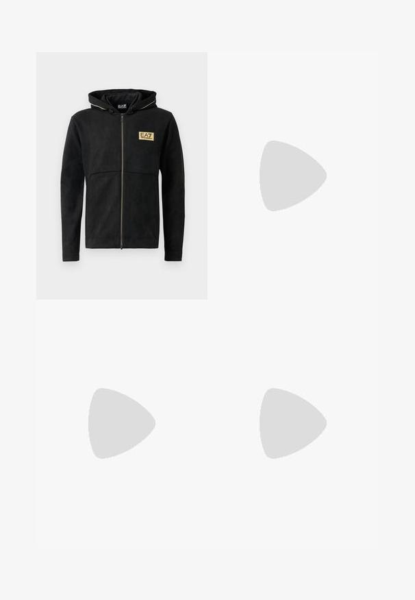 Black zip-up hoodie made of soft material, featuring a gold logo on the chest, contrasting zipper, and a drawstring hood.; Long-sleeved white cotton shirt with a round neckline, side slits at the bottom, and a smooth texture, displayed from the back.; Light blue denim jeans with a straight-leg design, five pockets, button closure, minimal fading, and contrasting stitching details.; White sneaker with a smooth leather upper and a low profile. Features a rounded toe, six eyelets, and a textured rubber sole.