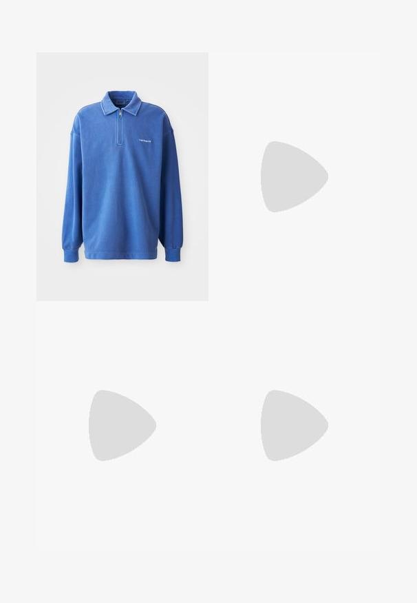 Blue pullover sweatshirt with a zippered collar, long sleeves, ribbed cuffs, and a small logo on the chest. Made of soft, textured fabric.; White cotton t-shirt with short sleeves, crew neck, featuring a small gold logo on the left chest area. Soft texture and regular fit.; Beige cotton trousers with a straight-leg design, featuring a front button closure, belt loops, and two side pockets. Smooth texture.; Black and white Nike Air Force 1 sneakers with a leather upper, perforated toe, and textured sole detail, worn with rolled beige pants and white socks.
