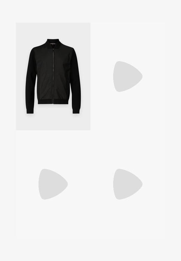 Michael Kors MIXED MEDIA  - Cardigan - black; Black cotton t-shirt with a crew neckline, short sleeves, and a small, tonal Armani Exchange logo on the chest. Simple, classic design.; Black tapered pants made of a soft fabric, featuring a waistband, pleats, and elastic ankles, designed for a comfortable fit.; Black leather sneakers with white rubber soles, featuring round laces, smooth surface, and subtle branding on the heel. Worn with blue jeans.