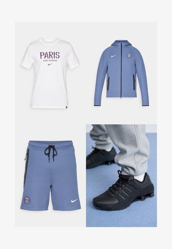 Modra zip-up bunda iz gladkega materiala, opremljena s kapuco, črnimi žepi na zadrgo in logotipom na prsih. Okrašena z belim Nike blagovno znamko.; Bela kratka majica s kratkimi rokavi, na kateri je napisan tekst "PARIS" v modrih in rdečih geometrijskih črkah ter "SAINT-GERMAIN" v manjšem besedilu spodaj. Vključena je Nikejeva oznaka.; Modri športni kratki hlače iz mehkega materiala, z črnimi stranskimi zadrgami, pasom s vrvico in logotipom Paris Saint-Germain na levi strani.; Oseba v črnih Nike Shox supergah in sivih trenirkah stoji na svetlo modrem preprogi.