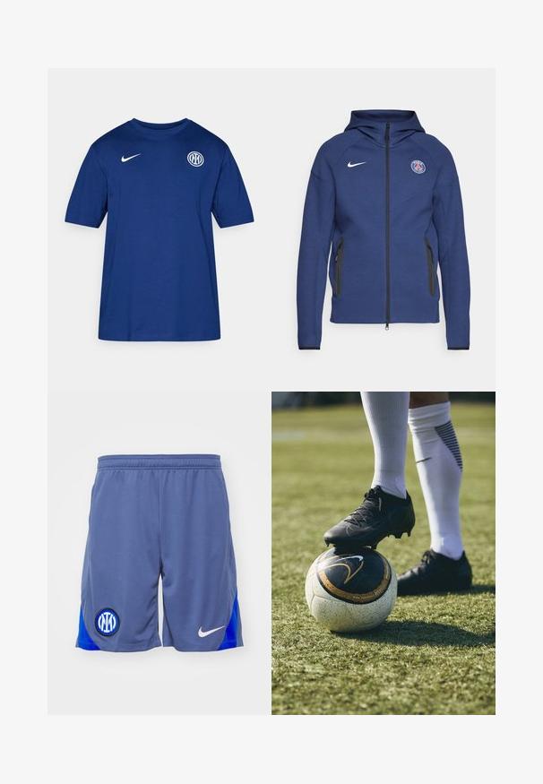 Felpa con cappuccio blu navy in morbido tessuto, dotata di zip a tutta lunghezza, tasche laterali e un'etichetta con logo. Ha un design strutturato con cappuccio.; T-shirt azzurro in cotone a maniche corte con colletto rotondo, caratterizzato da un logo Nike bianco sulla spalla e un emblema rotondo del club sul petto.; Pantaloni corti sportivi grigi con un pannello laterale blu, caratterizzati da un logo nero e blu sulla gamba sinistra e uno swoosh bianco della Nike sul lato destro.; Scarpino da calcio nero su una palla da calcio con motivo bianco e nero, poggiata su erba verde. Il cleat presenta materiali testurizzati e lacci.