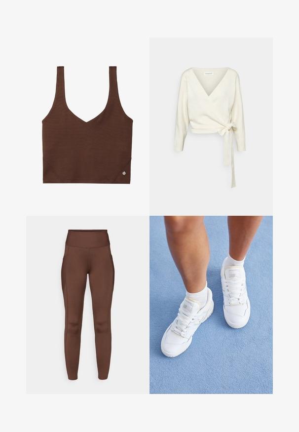Witte, wikkelstijl trui van zacht, textuurstof. Heeft een diepe V-hals en lange mouwen met een strikdetail op de taille.; Bruine sportbeha met een V-halsontwerp, gemaakt van gladde, rekbare stof. Het heeft brede banden en een klein logo-accent aan de zoom.; Bruine rekbare legging met een hoge tailleband, voorzien van zijzakken en een gladde textuur. Een naaddetail accentueert de vorm.; Benen in witte New Balance sneakers en witte sokken staan op een lichtblauwe, gestructureerde vloer.