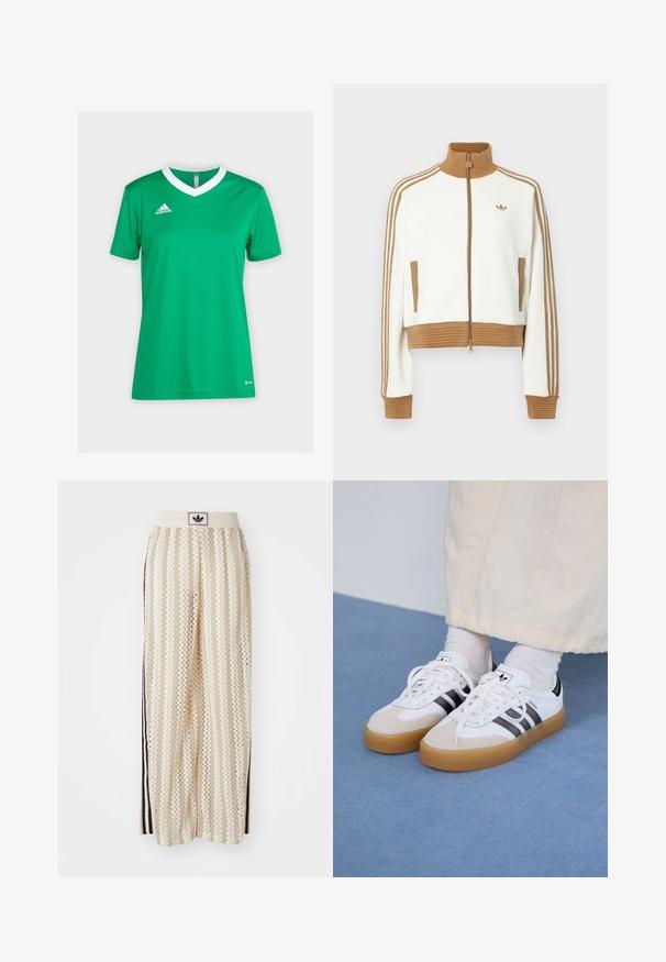 Jaqueta branca corta com um colarinho e punhos castanhos canelados. Apresenta dois bolsos laterais e três riscas castanhas nas mangas. Logótipo bordado.; Camisola atlética verde com um colarinho em V branco e mangas curtas. Feita de tecido respirável com o logótipo da Adidas no lado esquerdo do peito.; Calças largas de cor creme com um padrão em zigzag, apresentando uma cintura com logotipo preto e riscas laterais pretas. Tecido leve e texturizado.; Ténis brancos com riscas pretas e detalhes em camurça bege. Apresentam uma sola de borracha texturizada e atacadores brancos lisos, usados com meias de tom claro.