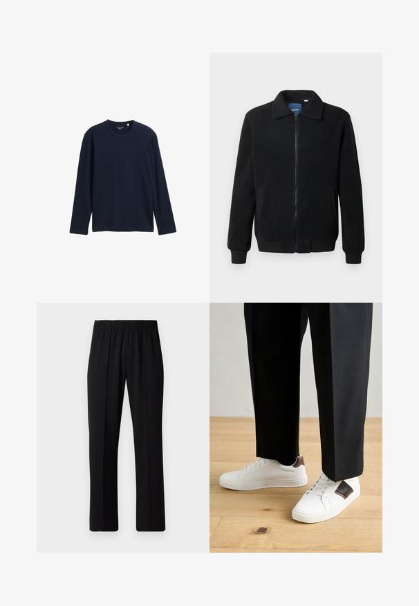 Jachetă din fleece neagră, cu închidere prin fermoar, guler înalt, manșete ribbate și buzunare laterale cu o suprafață texturată.; Tricou din bumbac moale, de culoare albastru închis, cu mânecă lungă, cu guler rotund și o croială relaxată, fără modele sau accente vizibile.; Pantaloni negri cu talie elastică, cu un design cu picioare drepte, având o textură netedă și fără modele sau accesorii vizibile.; Sneakers albe cu textură netedă, având accente din piele maro și detalii negre, asociate cu pantaloni negri pe măsură. Fundal din podea din lemn.