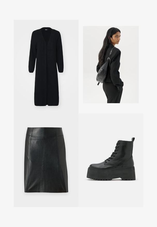 Cardigan lungo nero realizzato in tessuto a maglia testurizzato, con scollo a V, apertura frontale e maniche lunghe. Nessun fissaggio o motivo visibile.; Due magliette senza maniche, in bianco e nero, realizzate in cotone a coste, con colli rotondi e un design aderente. Etichette visibili su entrambe.; Gonna in pelle nera con un design aderente. Texture liscia, cuciture che delineano la forma e orlo dritto. Aspetto minimalista e slanciato.; Stivaletti neri con suola platform spessa, realizzati in pelle liscia, con un design alla schiava e una linguetta sul retro.; Donna con lunghi capelli scuri, vestita con un completo nero, che porta una borsa a tracolla in pelle nera, mentre guarda oltre la spalla su uno sfondo bianco.