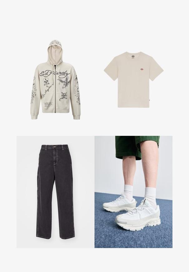 Felpa beige con zip e cappuccio. Presenta grafiche nere, comprese scritte e illustrazioni di un teschio e un'aquila. Due tasche frontali.; T-shirt in cotone color crema con maniche corte, scollatura rotonda e un piccolo logo ricamato multicolore sul petto.; Pantaloni in denim neri con vestibilità comoda, caratterizzati da cuciture bianche a contrasto e chiusura con bottone. Design a gamba dritta, senza tasche aggiuntive.; Scarpe da ginnastica bianche con sovrapposizioni testurizzate, suola spessa e accenti grigi. Indossate con calze corte bianche e pantaloni corti verdi su una superficie blu.