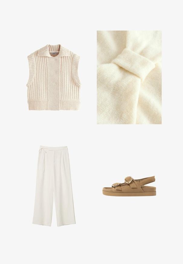 Gebreide mouwloze vest in lichtbeige, met een ribbelstructuur, brede kraag en een gestructureerd ontwerp met zijsplitten voor extra comfort.; Crème-kleurige stof met een zachte textuur, voorzien van een opvallende knoopdetail en subtiel geweven patroon.; Wijdvallende broek van off-white stof met een gladde textuur. Heeft een gestrikte taille en geplooide voorkant, ontworpen voor een ontspannen pasvorm.; Tan suède sandalen met twee verstelbare bandjes, gouden hardware-accenten en een dikke, gevoerde zool voor comfort en steun.
