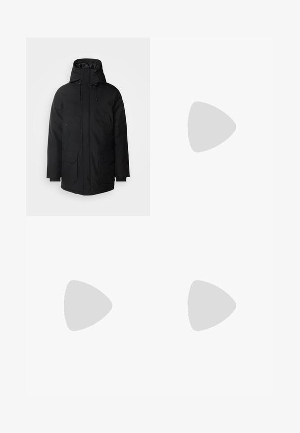 Schott Winter coat - black; Teal cotton crew-neck t-shirt featuring "Les Deux" printed in large white letters across the chest. Short sleeves and straight cut.; Beige trousers made from smooth fabric, featuring a straight-leg design, a front button closure, and subtle crease details along the front.; Black leather shoes with a rounded toe, lace-up design, and a thick, textured rubber sole. Features stitching along the edge and a smooth finish.; Black duffel bag made of textured synthetic material. Features two handles and an adjustable shoulder strap. Simple design with no visible patterns.