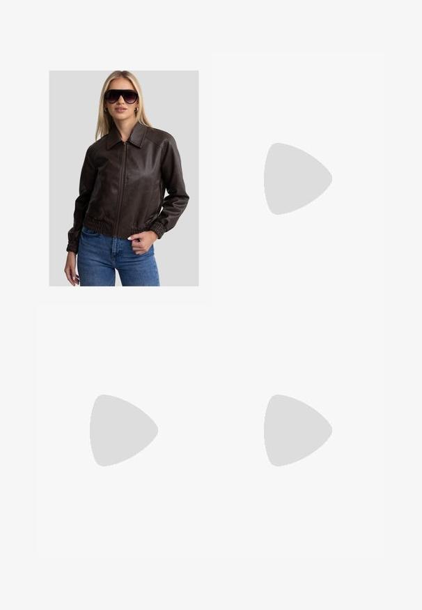 Veste en cuir marron style bombardier avec fermeture éclair à l'avant, grand col et poignets élastiques. Associée à un jean bleu et de grandes lunettes de soleil sombres.; T-shirt blanc oversize avec un graphique détaillé noir d'un aigle et de rubans dans le dos. Présente des manches courtes et un col rond.; Pantalons larges beige clair avec un cordon de serrage à la taille, présentant une texture légèrement rayée. Design décontracté avec poches latérales pour plus de commodité.; Sabots à imprimé vache marron et blanc avec une sangle à boucle, texture feutrée et semelle plate en caoutchouc. Design à bout rond.; Lunettes de soleil noires avec une monture rectangulaire slim, des verres teintés gris, une texture en plastique lisse et des branches courbées. Aucun marquage visible.