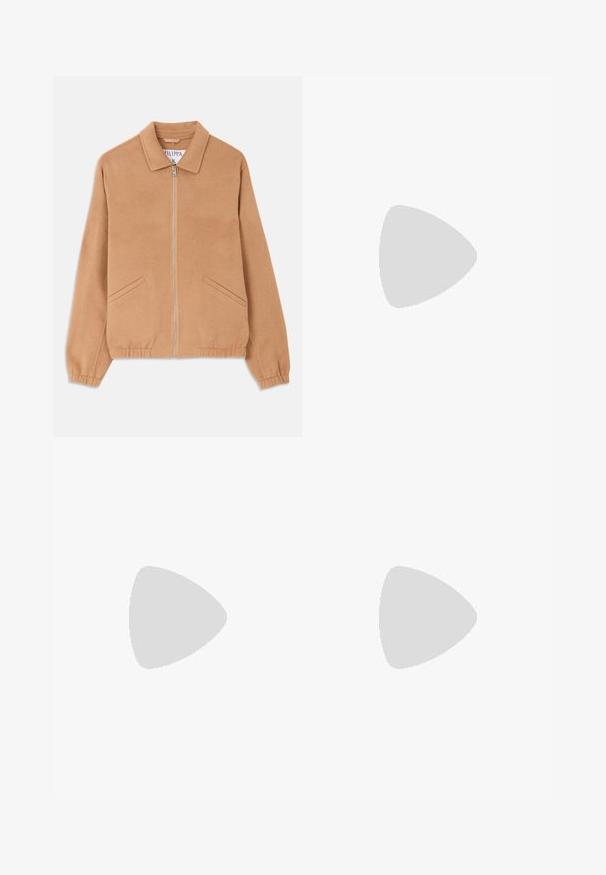 Tan wool-blend jacket with a collar, front zipper, and two angled pockets. Features a relaxed fit and ribbed cuffs. Textured fabric.; Brown knitted sweater with a v-neckline and pointed collar. Features a diamond pattern and long sleeves, made from a soft, textured fabric.; Denim wide-leg pants with an unfinished, distressed look, featuring colorful fabric patches and large cutouts throughout the design.; Sneakers in light yellow suede and leather, featuring a cushioned sole and stitched accents. Classic lace-up design with a rounded toe.