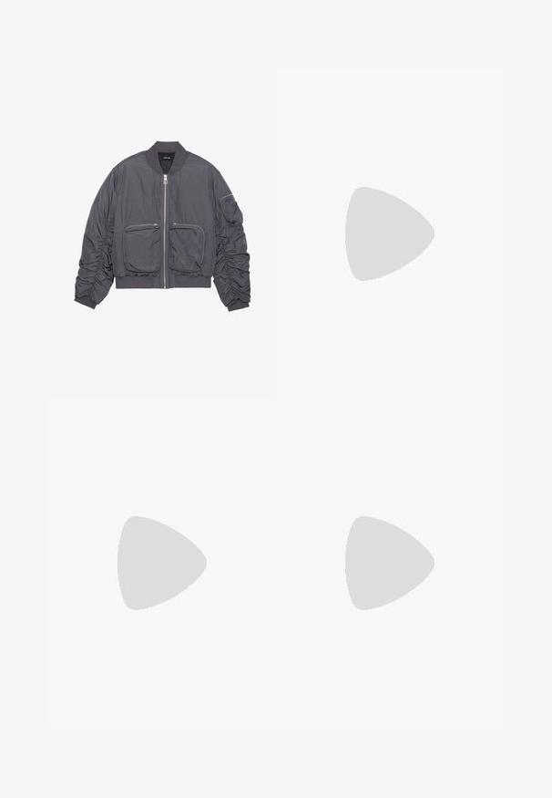 Mørkegrå bomberjakke med rynkede ermer, glidelås foran, to store glidelåslommer foran og en glidelåslomme på venstre erme.; Brun bomull T-skjorte med korte ermer som har et hvitt grafisk bilde av en musiker som spiller trompet og teksten "KID SUPER RECORDS."; Svarte rette denimjeans med fem lommer, beltehemper og knappelukking i livet, liggende flatt på en hvit bakgrunn.; Hvite og svarte joggesko med en glatt læroverdel, teksturerte detaljer og en kraftig hvit såle. Har en klassisk snøring.; Sorte rektangulære solbriller med mørke linser, tykk plastikkramme, gullaccenter på skulderpartiet og merkevarelogo gravert på armen.