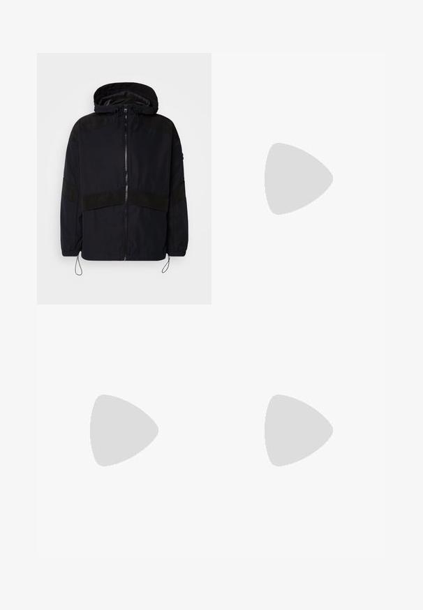 Black jacket with a hood, featuring a zip closure and contrasting matte textures across the shoulders and chest. Adjustable drawcord at hem.; Black cotton t-shirt featuring a rectangular graphic in blue and cream with circular patterns and doodles, designed for a relaxed fit.; Grey, relaxed-fit trousers with a textured finish, featuring a button closure, elastic waistband, and front pleats. Cropped ankle length.; Black leather sneaker with textured upper, padded collar, and red logo detail. Features a thick rubber sole with distinct tread pattern.