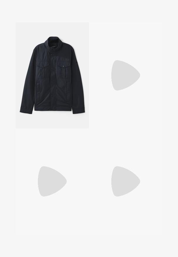 Navy jacket with a structured collar, snap button closure, two chest pockets, and a soft, matte finish. Designed for utility and comfort.; Henrik Vibskov BLOCK - Shirt - checks; Dark blue denim jeans with a straight-leg design, five pockets, and a classic button and zipper closure. Features contrast stitching.; Black suede sneakers with white rubber soles, featuring a rounded toe and laces, worn with gray tailored pants.