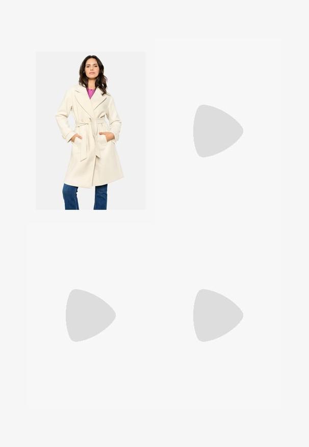 Cream-colored belted coat with a collar, two front pockets, and a textured fabric. Worn over a pink top and paired with blue jeans.; Two sleeveless ribbed turtleneck tops in black and white, featuring a fitted design and smooth texture, with cropped length.; Black wide-leg trousers made of lightweight fabric, featuring a front button closure and flat front, with neatly stitched hems.; Sport shoes with a white leather upper, gray suede toe, and three black stripes. Features a blue logo on the tongue and a textured rubber sole.