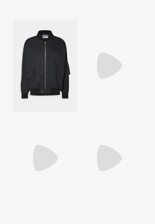 Giacca bomber nera con colletto a coste, zip frontale, tasche laterali e polsini elasticizzati. Realizzata in materiale liscio e leggero.; T-shirt nera a maniche corte con collo rotondo, dotata di un piccolo logo bianco "Filling Pieces" sul lato sinistro del petto.; Pantaloni larghi color marrone chiaro con una finitura liscia; presentano una chiusura frontale con bottone e tasche laterali. Realizzati in tessuto leggero.; Sneaker in suede nero con suola in gomma bianca, caratterizzato da cuciture tonali e design con lacci. Texture liscia con una forma moderna e aerodinamica.