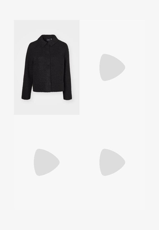 Black wool-blend jacket with a textured finish, collar, front closure, and side pockets. Features a boxy silhouette and long sleeves.; Black short-sleeve t-shirt with a round neckline, crafted from soft cotton fabric. Simple design, no visible logos or patterns.; Black pleated trousers with an elastic waistband. Features wide legs and a smooth, textured fabric with vertical stripes.; Black leather ankle boots with a chunky sole and side elastic panels, paired with dark blue jeans. The ground is light-colored.