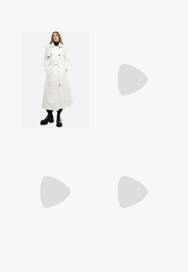 White long coat with double-breasted front, large buttons, and belted waist. Worn over a black turtleneck and paired with black chunky boots.; White cotton t-shirt with short sleeves and a round neckline. Features a black Adidas logo on the chest and a contrasting black inner collar.; Cream-colored wide-leg pants with a zigzag pattern, featuring a black logo waistband and side black stripes. Lightweight, textured fabric.; Cream and lavender sneakers with three stripes and a textured brown sole, featuring laces and a padded heel. Soft fabric upper.