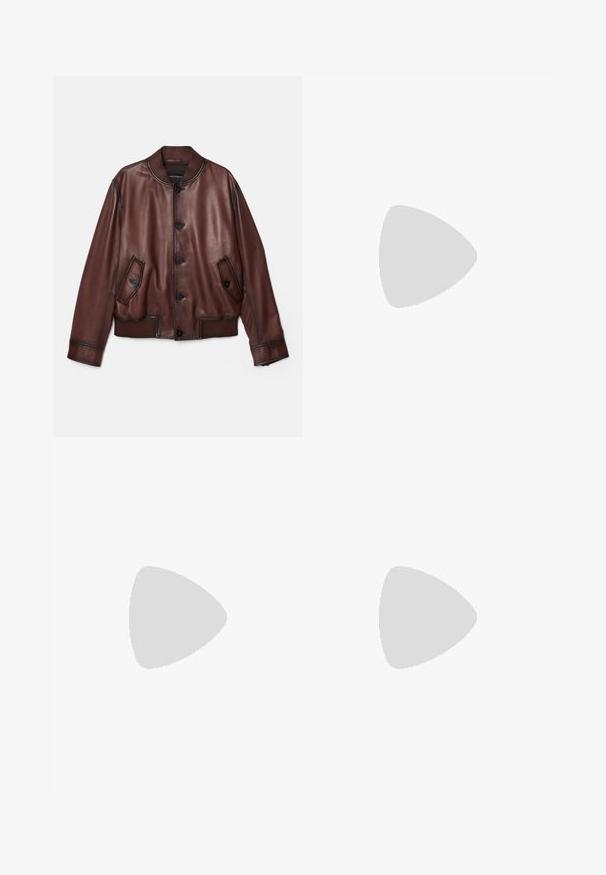 Brown leather bomber jacket with a ribbed collar, two front pockets, and button closures. Smooth texture and relaxed fit.; White cotton t-shirt with short sleeves, crew neck, and black accent at the collar. Features a small black logo on the left chest.; Beige trousers with a straight fit, featuring a drawstring waist, pleated front, and smooth texture. Simple, versatile design.; Tiger of Sweden ACADEMI - Slip-ons - black