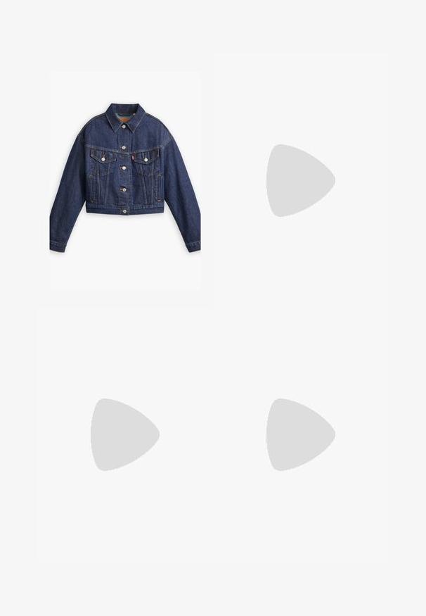 Levi's® SHRUNKEN 90S TRUCKER - Denim jacket - remember together; White long-sleeve shirt with a collared neckline, featuring eyelet embroidery in a paisley pattern and button closures down the front.; Dark blue denim flared jeans with a high waist, featuring five pockets, a button closure, and visible stitching detail along the seams.; White leather sneaker with perforated toe box, textured sole, and white laces, paired with wide red pants and a blue and yellow background.