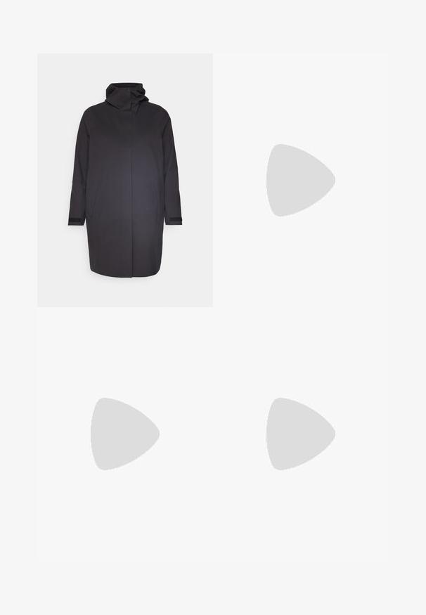 Peak Performance - Kurtka Softshell; Biała bawełniana koszulka z krótkim rękawem, okrągłym dekoltem, luźny krój, noszona z zielonymi szortami. Gładka faktura, bez widocznych wzorów czy akcentów.; Czarne szorty z miękkiego materiału, z elastycznym pasem w talii i sznurkiem do regulacji, kieszeniami bocznymi oraz prostym, eleganckim wzornictwem.; Białe buty do biegania z siateczkową cholewką, odblaskowymi akcentami oraz wyściełaną podeszwą z głębokim bieżnikiem zapewniającym przyczepność. W zestawie elastyczne sznurowadła.; Białe okulary przeciwsłoneczne z brązowymi soczewkami, owalny kształt, wykonane z gładkiego plastiku, z szarymi akcentami na zausznikach i logo na oprawce.