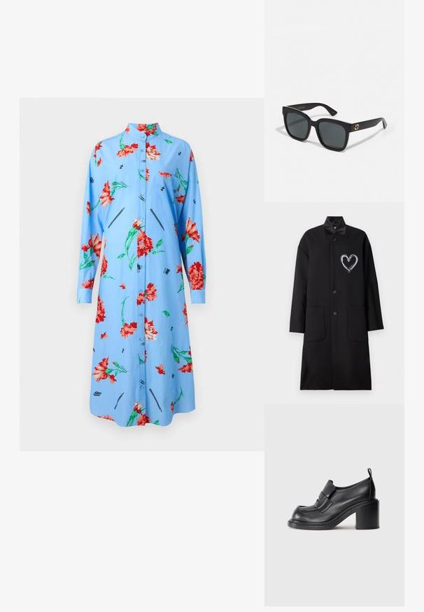 Mustapuku, jossa on sydänkuvio valkoisella maalilla, valmistettu sileästä materiaalista, kauluksella, napituksilla ja kahdella etutaskulla.; Vaaleansininen mekko, jossa on pitkät hihat, punaisia ja vihreitä kukkakuoseja, napitettava etuosa, kaulus ja painettuja yksityiskohtia, kuten kyniä ja perhosia.; Mustat nahkaiset korkokengät, joissa on pyöreä nenä, huomattava nauha vampin yli ja tukevan korko muotoilu. Tassun pinta on sileä ja ompeleet ovat minimaalista.; Mustat aurinkolasit, joissa on suorakulmaiset linssit, kiiltävä pinta ja kultaiset logoleimat temppeleissä. Tummanharmaat linssit tarjoavat UV-suojan.