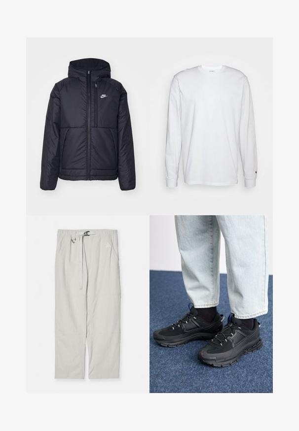 Black, padded Nike jacket with a front zipper and hood. Features a white logo on the left chest and dual front pockets. Smooth exterior texture.; White long-sleeved T-shirt made of cotton. Crew neck design with ribbed cuffs and a small logo on the left sleeve. Smooth texture.; Nike ACG HIKE PANT - Trousers - orewood brown/summit white; Black athletic shoes with textured fabric and rubber soles, featuring elastic laces and a blue accent on the heel. Worn with light denim pants.