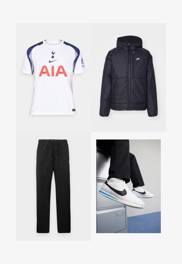 Musta, pehmustettu Nike-takki, jossa on etuvetoketju ja huppu. Vasemmassa rinnassa on valkoinen logo ja takissa on kaksinkertaiset etutaskut. Pintakoe on sileä.; Valkoinen jalkapallopaita tummansinisillä yksityiskohdilla, jossa on suuret punaiset kirjaimet "AIA", seuran logo rinnassa ja Nike-brändäys.; Mustat collegehousut, jotka on valmistettu fleece-materiaalista ja joissa on joustava vyötärö, jossa on kiristysnyörit, kaksi etutaskua ja pieni logo reidessä.; Valkoiset nahkakengät, joissa on musta Nike-logomerkki, vaaleansininen ja harmaa kumipohja sekä klassinen nauhakiinnitys. Jalat lepäävät asiakirjakaapilla.