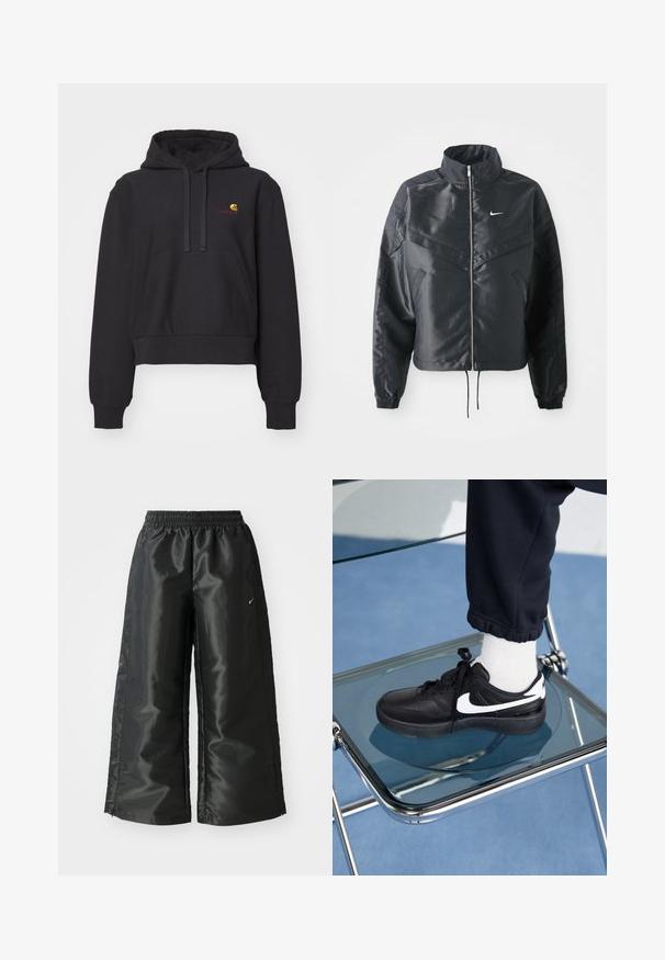Zwarte cropped jack met hoge kraag, ritsluiting, elastische manchetten en een wit Nike-logo. Glad, glanzend materiaal met een licht gestructureerd oppervlak.; Zwarte korte hoodie van zacht materiaal, met een buidelzak, capuchon met trekkoord en een geborduurd logo in geel en rood.; Zwarte sportbroek van een glanzende, gladde stof, met een elastische tailleband, wijde pijpen en een klein logo aan de linkerkant.; Zwarte Nike sneakers met witte accenten, met een gladde leren textuur, vetersluiting en ronde neus, geplaatst op een glazen stoel.