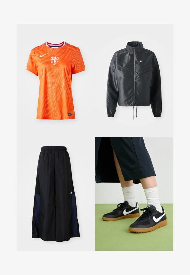 Sort cropped jakke med høj krave, lynlås lukning, elastiske manchetter og et hvidt Nike-logo. Glat, blankt stof med en let struktureret overflade.; Orange fodboldtrøje med hvidt lionemblem, rund halsudskæring med røde og blå detaljer, prikket mønster, korte ærmer og sort mærkeddetail.; Sorte vide benbukser lavet af letvægtsstof, med et marineblåt sidepanel og en elastisk talje. Lille hvidt logo nederst.; Sorte læder- og syntetiske sneakers med hvid Nike swoosh, gummisål, rund tå og sorte snørebånd. Ribbede hvide sokker synlige.