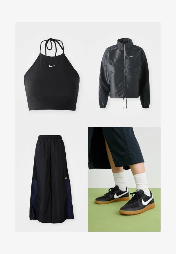 Svart kort jacka med hög krage, dragkedja, ärmslut i elastan och en vit Nike-logotyp. Slät, glänsande tyg med en något strukturerad yta.; Svart halterneck crop top tillverkad av stretchmaterial, med en subtil vit Nike-logotyp, som har en knytning och en sömlös finish.; Svarta vida byxor gjorda av lättviktig tyg, med en marinblå sid panel och ett elastiskt midjeband. Litet vitt logotyp nertill.; Svarta läder- och syntetiska sneakers med vit Nike-logga, gummisula, rund tå och svarta snörningar. Ribbad vit strumpor synliga.