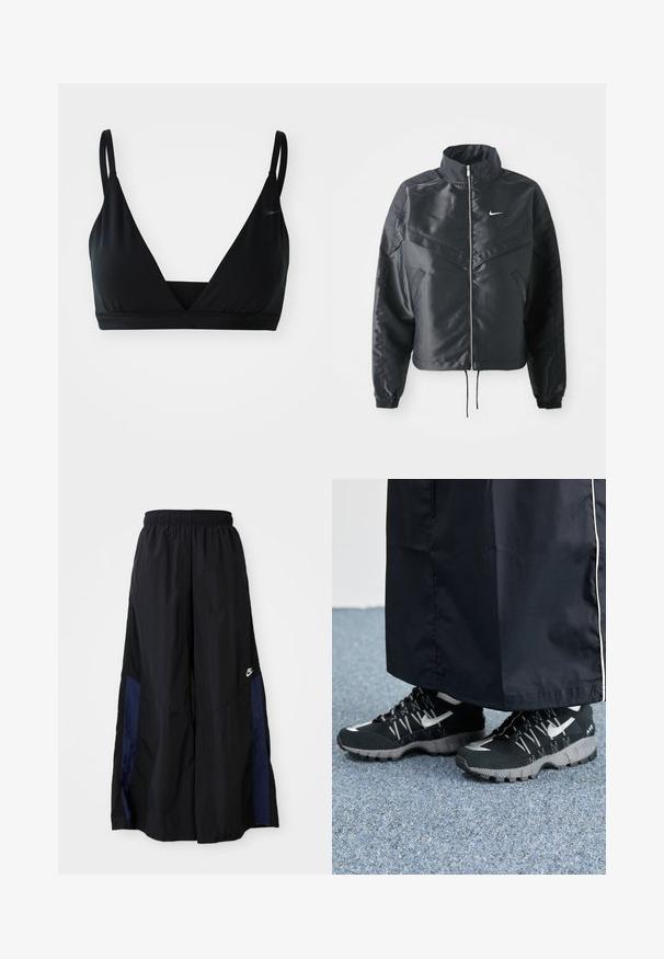 Must kolledžiga must lühike jope, millel on lukuga sulgus, elastne mansett ja valge Nike logo. Sile, läikiv kangas, millel on veidi tekstureeritud pind.; Mustraegus mustriga, valmistatud siledast kangast, õhukeste reguleeritavate rihmadega ja väikese logoga ühel küljel.; Mustad laiad mustad püksid kergest kangast, millel on tumesinine külgpaneel ja elastne vöökoht. Väike valge logo allservas.; Mustad mustrehilised mustad spordijalatsid, millel on tekstuurne pealmine osa, hõbedased aktsendid ja mustriga tallaosad, koos musta pika riietusega. Seatud sinise vaiba taustale.