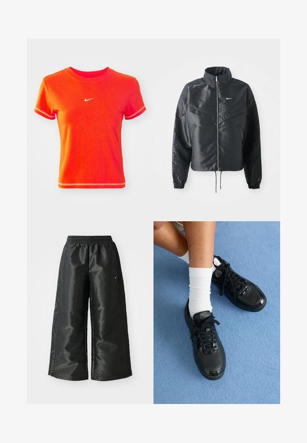 Chaqueta negra corta con cuello alto, cierre de cremallera, puños de elastano y un logo de Nike en blanco. Tejido suave y brillante con una superficie ligeramente texturizada.; Camiseta corta roja de algodón, con un cuello redondo acanalado y mangas cortas. Presenta un pequeño logo blanco de Nike en la parte delantera.; Pantalones deportivos negros de tejido brillante y suave, con una cinturilla elástica, pierna ancha y un pequeño logo en el lado izquierdo.; Las zapatillas negras de Nike presentan un exterior texturizado, acentos brillantes y cordones redondos. Están acompañadas de calcetines blancos de canalé sobre una superficie azul claro.