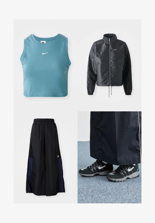 Svart kort jacka med hög krage, dragkedja, ärmslut i elastan och en vit Nike-logotyp. Slät, glänsande tyg med en något strukturerad yta.; Kort, ärmlös tanktopp i ljusblå ribbad material med en vit Nike-logotyp på bröstet och rundad halsringning.; Svarta vida byxor gjorda av lättviktig tyg, med en marinblå sid panel och ett elastiskt midjeband. Litet vitt logotyp nertill.; Svarta träningsskor med en texturerad överdel, silverdetaljer och ett mönstrat yttersula, tillsammans med en svart lång klädnad. Mot en blå matta.