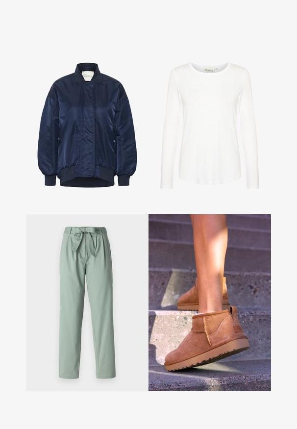 Marinblå bomberjacka, glansigt material, ribbade muddar och nederkant, knappstängning fram, sidofickor, vadderade detaljer på kroppen.; Vit långärmad tröja med rund halsringning. Gjord av ett glatt tyg med en figurnära passform. Etikett synlig vid nacken. Inga mönster eller detaljer.; Ljusgröna byxor med hög midja, framfickor och ett knytbälte i midjan. Tillverkade av ett mjukt, lätt tyg. Rakt bensnitt.; Tan mockasiner med en mjuk textur, sömnadsdetaljer och en gummisula, med en öglad häl för enkel påtagning.