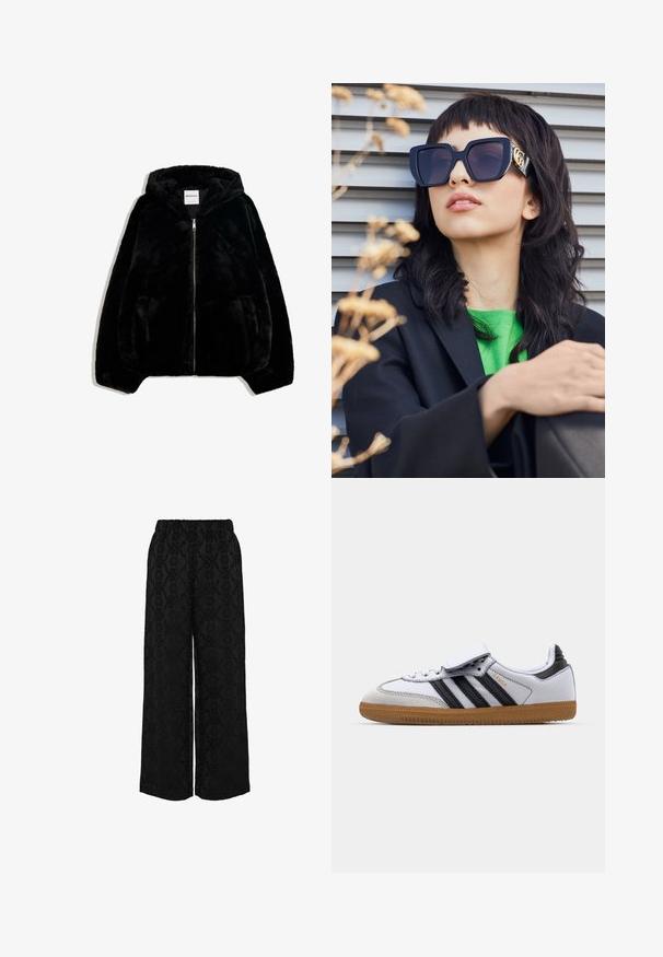 Zwarte nepbontjas met een ritssluiting aan de voorkant, capuchon en zijzakken. Beschikt over een gladde textuur en een losvallende pasvorm voor comfort.; Gestreepte sweatshirt in zwart en grijs, met een off-the-shoulder ontwerp en een opvallende witte "92" print op de voorkant. Zachte textuur, met cuffs aan de mouwen.; Zwarte wijde broek met een textuurpatroon van bloem- en draaiende ontwerpen, elastische tailleband en een losse pasvorm.; Witte leren sneaker met zwarte strepen en grijze accenten, met een afgeronde neus en een gumrubberen buitenzool. Klittenbandsluiting en veters.; Overgedimensioneerde zwarte zonnebril met een dikke rand en gouden accent, gedragen met een zwarte blazer en felgroen shirt, tegen een horizontale achtergrond.