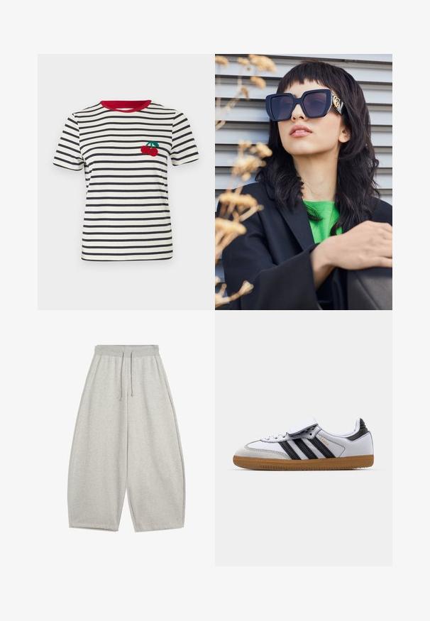 Schwarze Kunstfelljacke mit Reißverschluss vorne, Kapuze und Seitentaschen. Sie verfügt über eine glatte Textur und eine lockere Passform für zusätzlichen Komfort.; Gestreiftes T-Shirt in Creme und Marineblau, mit einem roten Kragen. Verfügt über ein gesticktes Kirschdesign im linken Brustbereich. Kurze Ärmel.; Hellgraue weite Sweatpants mit elastischem Bund und Kordelzug, ausgestattet mit Seitentaschen und entspannter Passform.; Weiße Ledersneaker mit schwarzen Streifen und grauen Akzenten, ausgestattet mit einer runden Zehenpartie und einer Laufsohle aus Gummi. Mit Klettverschluss und Schnürung.; Übergroße schwarze Sonnenbrille mit dickem Rahmen und goldenen Akzenten, getragen mit einem schwarzen Blazer und einem leuchtend grünen Hemd, vor einem horizontalen Hintergrund.