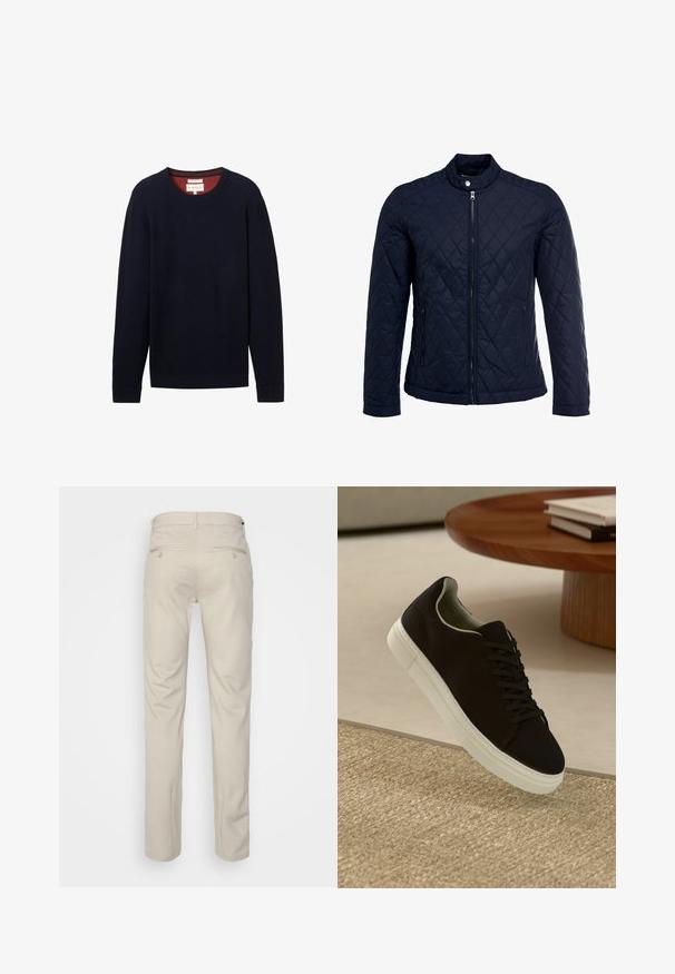 Giacca trapuntata blu navy con colletto alto, zip frontale completa e due tasche laterali. Il materiale ha una texture liscia con motivi a rombi.; Maglione a coste blu navy con maniche lunghe e scollatura rotonda. Il colletto interno presenta un bordo rosso a contrasto. Etichetta visibile.; Pantaloni beige con una texture liscia, taglio dritto, due tasche posteriori con bottoni e vita standard.; Sneaker nero con suola bianca che flotta sopra un tappeto beige testurizzato vicino a un tavolo rotondo in legno con libri impilati.