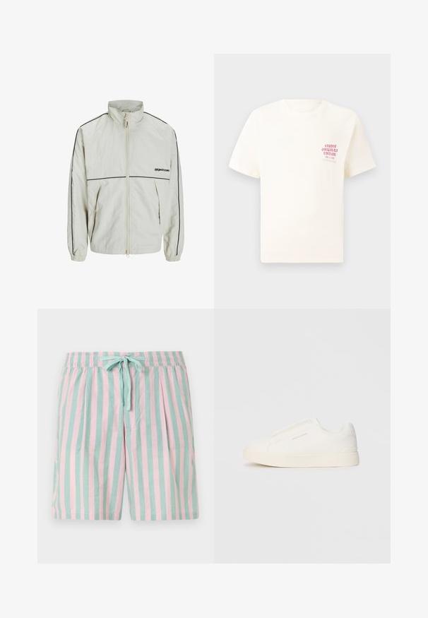 Lett cremet jakke med høj krave, frontlynlås og sorte sidestropper; har elastiske manchetter og et beskedent logo på forsiden.; Hvid kortermet T-shirt med rød tekst "Studio Originals Edition" på venstre bryst, vist på en neutral grå baggrund.; Letvægts stribede shorts med skiftevis teal og pink lodrette striber, en elastisk talje og en frontknude-detalje.; Hvide slip-on sneakers med en struktureret overflade, en tyk sål og et minimalistisk design. Har brandlogoet på siden.