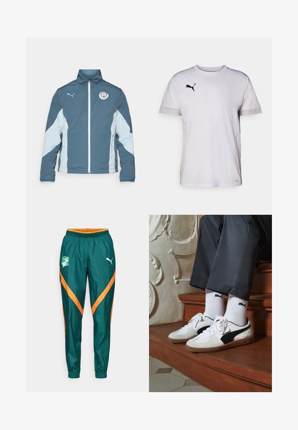 Windbreaker-Jacke in Dunkelblau und Hellblau, mit durchgehendem Reißverschluss, hohem Kragen und dem Manchester City-Logo auf der Brust.; Weißes kurzärmeliges Sportshirt mit Rundhalsausschnitt, ausgestattet mit atmungsaktiven Netzdetails an den Seiten und einem schwarzen Puma-Logo auf der Brust.; Grüne Jogginghose mit orangefarbenen Chevronstreifen, einem elastischen Bund und einem Logo-Patch auf dem linken Oberschenkel. Aus glattem Material gefertigt.; Puma-Sneaker aus weißem und schwarzem Wildleder mit einer braunen Gummisohle. Kombiniert mit weißen Socken, die ein schwarzes Logo zeigen, getragen zu dunklen Hosen.