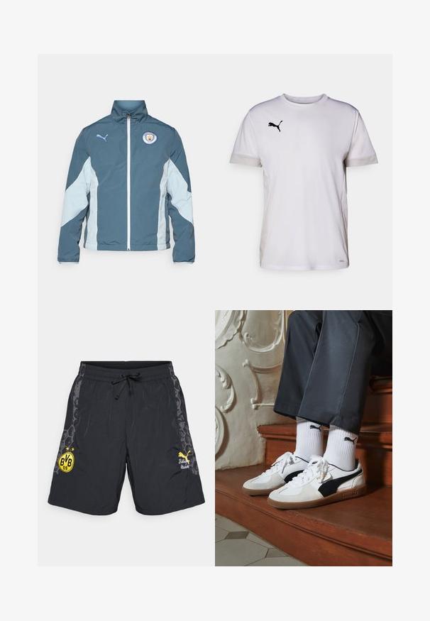 Chaqueta cortavientos en azul oscuro y azul claro, con cierre de cremallera en la parte delantera, cuello alto y el logo del Manchester City en el pecho.; Camiseta atlética blanca de manga corta con cuello redondo, que cuenta con acentos de malla transpirable en los lados y un logo negro de Puma en el pecho.; Pantalones cortos deportivos negros con cintura elástica y cordón. Presentan el logo del club en amarillo y gráficos de acento en los lados. Material ligero.; Zapatillas Puma en gamuza blanca y negra, con una suela de goma marrón. Combinadas con calcetines blancos que muestran un logo negro, llevados con pantalones oscuros.