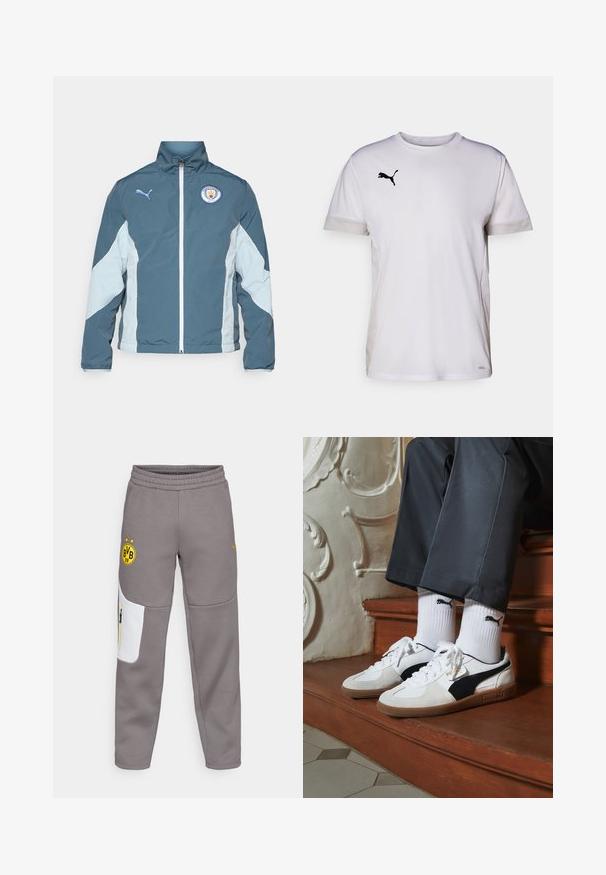 Kurtka typu windbreaker w ciemnym odcieniu teal i jasnym niebieskim, posiadająca zamek z przodu, wysoki kołnierz oraz logo Manchester City na piersi.; Biała koszulka sportowa z krótkim rękawem i okrągłym dekoltem, z oddychającymi wstawkami z siateczki po bokach oraz czarnym logo Pumy na piersi.; Szare dresy z białą łatą, elastycznym paskiem w talii, żółtym logo i żółtym akcentem na suwak. Miękka faktura i zwężany krój.; Sneakers Puma w białym i czarnym zamszu, z brązową gumową podeszwą. W połączeniu z białymi skarpetkami z czarnym logo, noszone z ciemnymi spodniami.