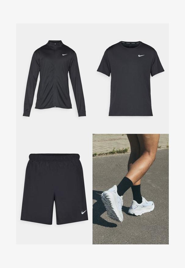 Jacket desportivo preto com mangas longas, colarinho e fecho zip completo. Apresenta um discreto logotipo da Nike em branco na parte superior do lado esquerdo do peito. Textura suave.; T-shirt de corrida Nike preto, feito de material leve e respirável, com mangas curtas e um pequeno logo branco no peito.; Calças de desporto pretas feitas de material leve com uma cintura elástica. Apresenta um pequeno logótipo branco da Nike no canto inferior esquerdo.; Sapatilhas brancas de corrida com parte superior texturizada, sola espessa branca e detalhes pretos, combinadas com meias pretas até ao tornozelo numa superfície pavimentada.
