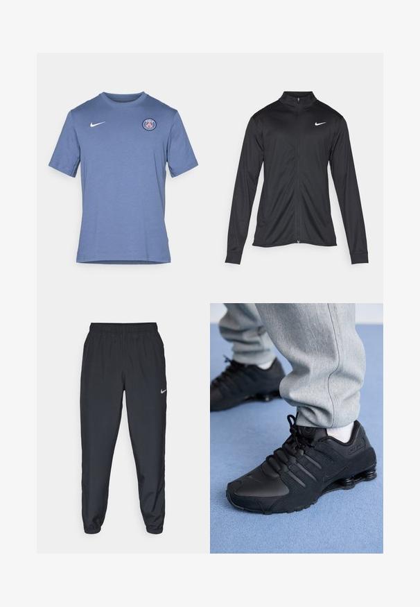 Čierna športová bunda s dlhými rukávmi, golierom a plným zipsom. Obsahuje nenápadné logo Nike v bielej farbe na hornej ľavej hrudi. Hladká textúra.; Krátky rukáv modré tričko vyrobené z bavlnenej zmesi. Obsahuje biele logo Nike a okrúhle logo Paríža na ľavej hrudi. Mäkká textúra.; Čierne teplákové nohavice vyrobené z ľahkého materiálu s elastickým pásom, manžetami na členkoch a diskrétnym logom Nike na ľavej strane.; Osoba v čiernych teniskách Nike Shox a šedých teplákoch stojí na svetlomodrom koberci.