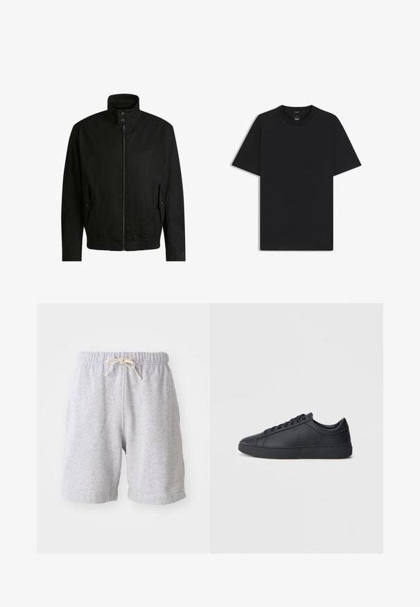 Zwarte jas met een hoge kraag, ritssluiting aan de voorkant en elastische tailleband. Voorzien van zijzakken met deksels en subtiele logo-details.; Zwarte korte mouwen T-shirt van een gladde katoenmix, met een ronde halslijn en een minimalistisch ontwerp zonder patronen of accenten.; Grijze katoenen shorts met een elastische tailleband en trekkoord. Halverwege de bovenbenen, met zijnaad en een zachte textuur. Geen zakken of zichtbaar patroon.; Zwarte sneakers van glad leer met een lage schacht, ronde neus en platte rubberen zool. Voorzien van veters en subtiele branding.
