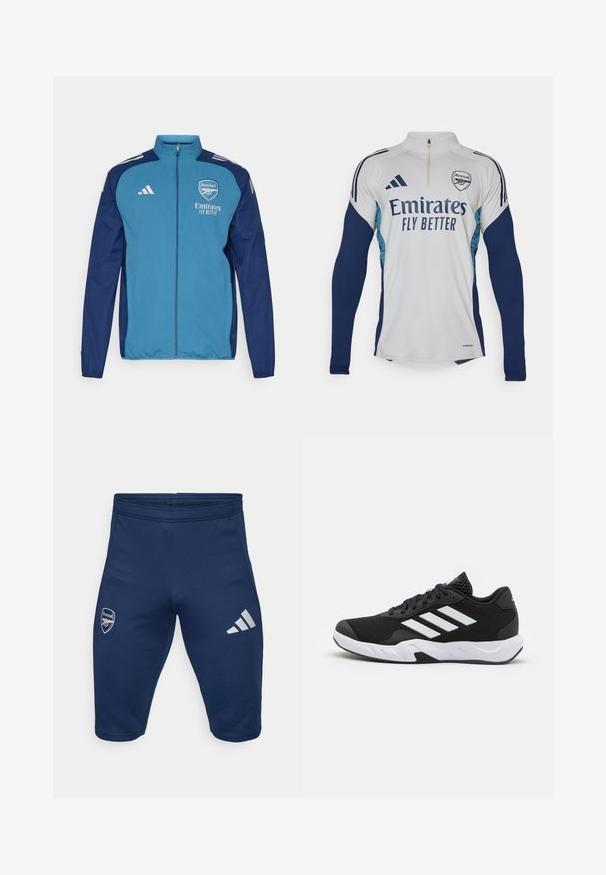 Giacca blu e navy con zip, caratterizzata dal logo dell'Arsenal, branding "Emirates" e strisce bianche Adidas sulle spalle. Tessuto morbido, taglio atletico.; Maglia a maniche lunghe bianca con accenti blu navy, colletto a mezza zip, con il logo "Emirates Fly Better" e il simbolo del club Arsenal.; Pantaloni sportivi navy in tessuto elasticizzato, con il logo dell'Arsenal sulla gamba sinistra e tre strisce bianche Adidas sulla gamba destra.; Scarpe da ginnastica nere con una tomaia in mesh texturizzata, strisce bianche di accento, suola imbottita e tallone rinforzato per supporto.