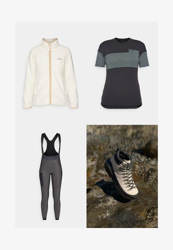 Biała polarowa kurtka z wysokim kołnierzem, posiadająca pełny zamek błyskawiczny z przodu, brązowe akcenty oraz kieszeń na lewym cieśnie z naszywką z logo.; Koszulka z krótkim rękawem w ciemnoszarym i szmaragdowym kolorze z poziomym paskiem kolorystycznym, z kieszonką na piersi i metką na dekolcie.; Bib-style spodenki rowerowe w ciemnoszarym kolorze. Wykonane z elastycznego materiału, posiadające wyściółkę, siateczkowe ramiączka oraz boczną kieszeń. Gładka tekstura.; Jasnobeżowe buty trekkingowe z czarną gumową podeszwą, elastyczną cholewką, metalowymi oczkami i szarymi sznurowadłami, umieszczone na skalistym podłożu.