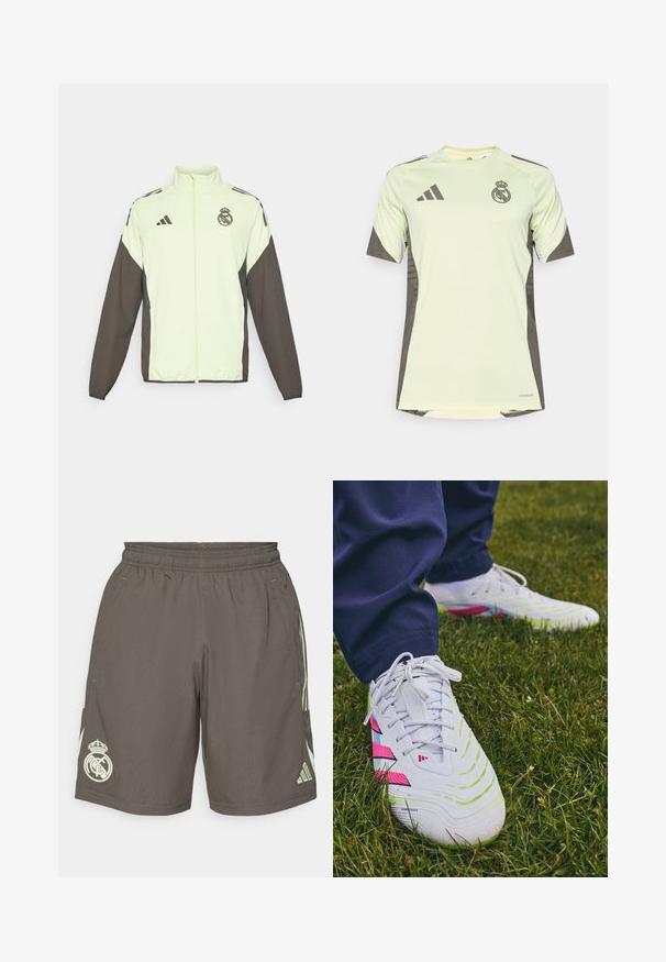 Casaco Adidas com um corpo verde claro e mangas castanhas escuras. Inclui um colarinho alto, fecho de correr à frente e logótipo no peito.; Jersey verde claro de mangas curtas com detalhes em cinza escuro, apresentando o logótipo da equipa no peito, feito de material respirável com tecnologia de absorção de humidade.; Calções atléticos cinzentos com um cós elástico, riscas laterais verde claro e um logotipo branco do Real Madrid na bainha esquerda.; Tênis atléticos brancos com superfícies texturizadas, acentos verdes e rosas, e um padrão de sola distinto, em cima da grama.