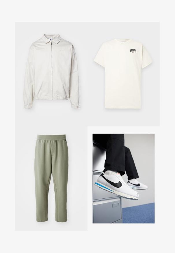 Bela, lahka Nike jakna z ovratnikom, sprednjim zadrgo, elastičnimi manšetami in majhnim logotipom na levem prsnem delu. Gladka tekstura.; Kremasta bombažna majica s kratkimi rokavi, z natisnjenim napisom "NIKE SB" v črni in rdeči barvi na prsih. Standardni okrogli izrez.; Svetlo olivnozeleni uski hlače iz meke tkanine, z elastičnim pasom, sprednjim žepom in diskretnimi šivi.; Bele usnjene teniske z črnim Nikeovim simbolom, svetlo modrim in sivo gumijastim podplatom ter klasičnim vezalnim dizajnom. Noge so poležane na omarici za dokumente.