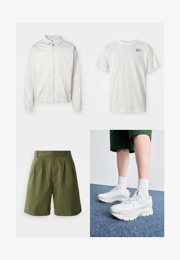 Giacca Nike bianca, leggera, con colletto, zip frontale, polsini elasticizzati e un piccolo logo sul lato sinistro del petto. Texture liscia.; T-shirt bianco in cotone a maniche corte, con logo Nike ricamato in blu navy sul lato sinistro del petto. Design con collo a giro standard.; Pantaloni corti verde oliva realizzati in tessuto leggero, con una parte anteriore plissettata, chiusura con bottone e tasche laterali, dal design dritto.; Scarpe da ginnastica bianche con sovrapposizioni testurizzate, suola spessa e accenti grigi. Indossate con calze corte bianche e pantaloni corti verdi su una superficie blu.